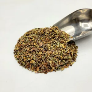 Tisane bio La Dégrippe du Docteur Sammut pour les défenses immunitaires avec composition de plantes médicinales et pelle à thé.